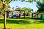 Yarra 1 with floral graphic panels in park setting